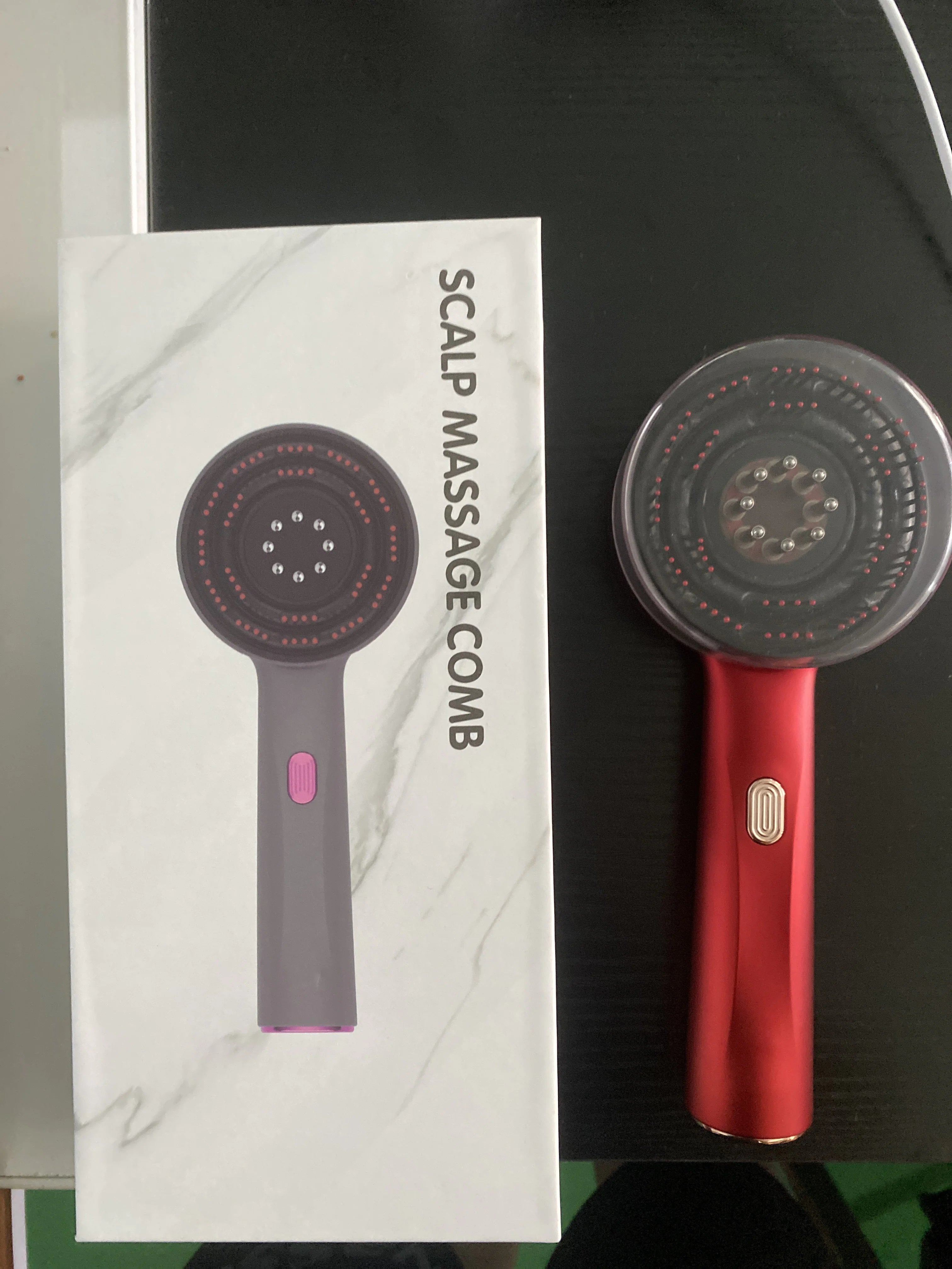 Pettine per massaggio elettrico